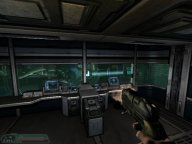 A contorl room for the laser beam seen in the background